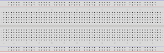 Image of a breadboard https://www.flickr.com/photos/adafruit/23346083742 License: Sharealike-2.0